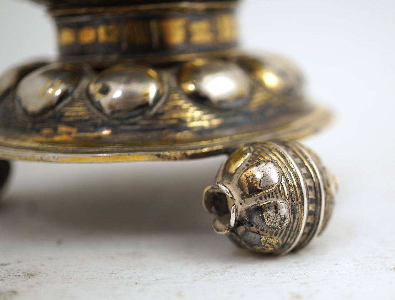 A 16th/17th century German silver gilt 'pineapple' cup and cover